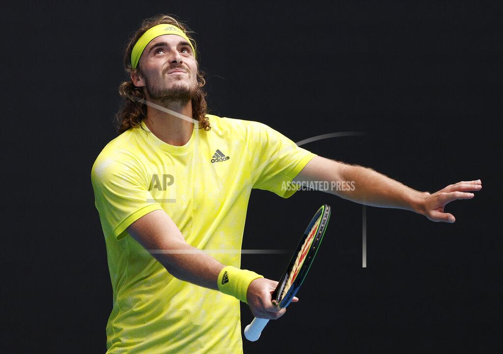 Rick Rycroft Greece's Stefanos Tsitsipas gestures during his second round game against Australia's Thanasi Kokkinakis at the Australian Open tennis championship in Melbourne, Australia, Thursday, Feb. 11, 2021.(AP Photo/Rick Rycroft)