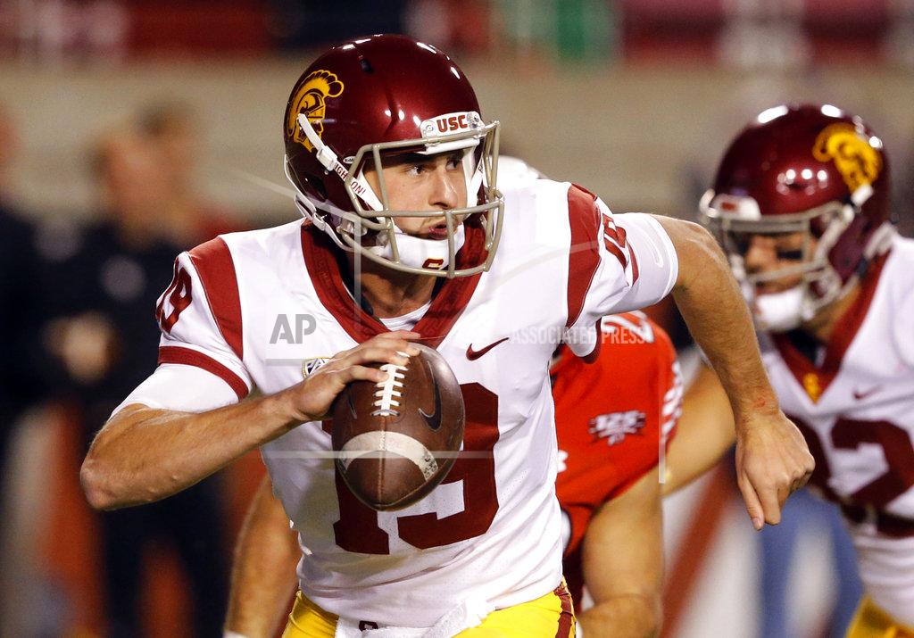 Rick Bowmer Southern California quarterback Matt Fink (19) looks down field in the second half during an NCAA college football game against Utah Saturday, Oct. 20, 2018, in Salt Lake City. (AP Photo/Rick Bowmer)