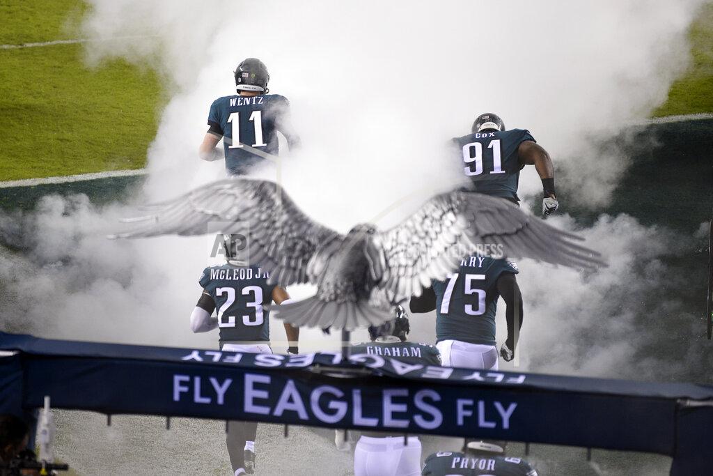 Derik Hamilton Philadelphia Eagles' Carson Wentz (11) and Fletcher Cox (91) run onto the field before an NFL football game against the Seattle Seahawks, Monday, Nov. 30, 2020, in Philadelphia. (AP Photo/Derik Hamilton)