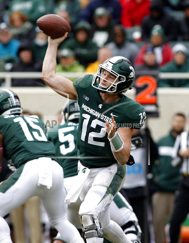 Al Goldis Michigan State quarterback Rocky Lombardi throws a pass against Purdue during the fourth quarter of an NCAA college football game, Saturday, Oct. 27, 2018, in East Lansing, Mich. Michigan State won 23-13. (AP Photo/Al Goldis)