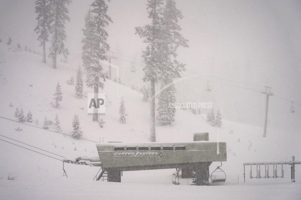 Christian Pondella In this photo provided by Mammoth Mountain Ski Area, snow falls on Mammoth Mountain, Monday, Oct. 25, 2021, in Mammoth Lakes, Calif. (Christian Pondella/Mammoth Mountain Ski Area via AP)