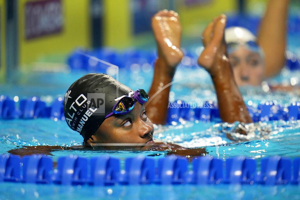 Jeff Roberson Simone Manuel looks up at her time after swimming in the women's 50 freestyle during wave 2 of the U.S. Olympic Swim Trials on Saturday, June 19, 2021, in Omaha, Neb. (AP Photo/Jeff Roberson)
