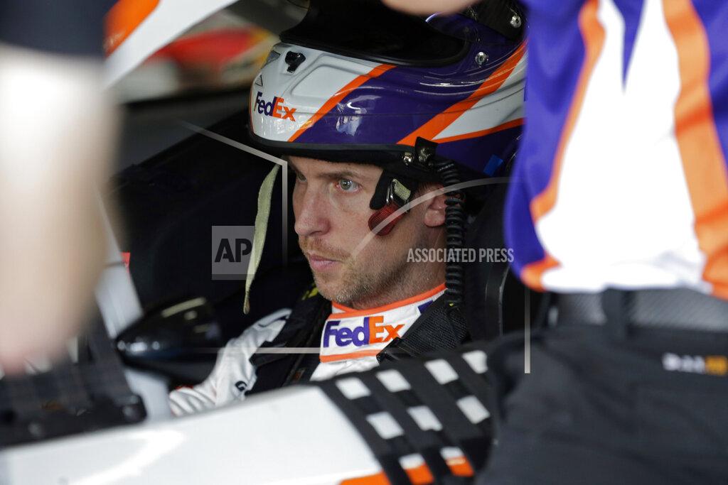 Gerry Broome Denny Hamlin waits in his car during practice for Sunday's NASCAR Cup Series auto race at Charlotte Motor Speedway in Concord, N.C., Saturday, Sept. 28, 2019. (AP Photo/Gerry Broome)