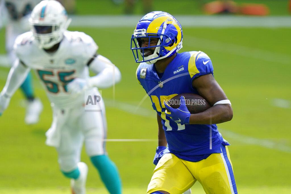 Lynne Sladky Los Angeles Rams wide receiver Robert Woods (17) runs for a touchdown during the first half of an NFL football game against the Miami Dolphins, Sunday, Nov. 1, 2020, in Miami Gardens, Fla. (AP Photo/Lynne Sladky)