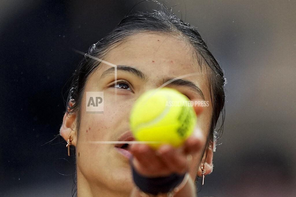 Michel Euler Britain's Emma Raducanu serves against Linda Noskova of the Czech Republic during their first round match at the French Open tennis tournament in Roland Garros stadium in Paris, France, Monday, May 23, 2022. (AP Photo/Michel Euler)