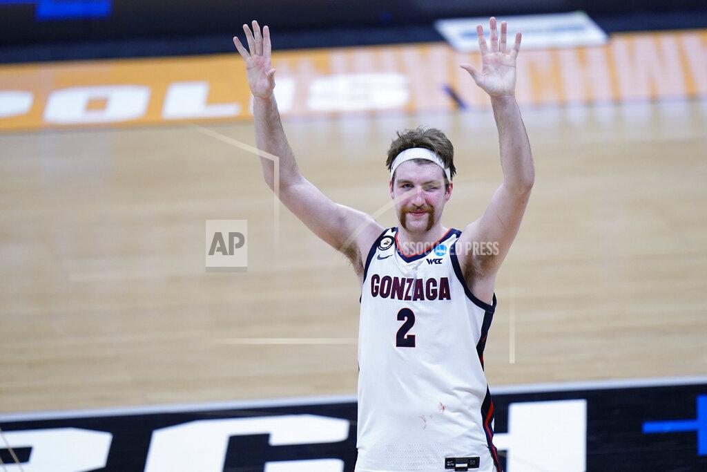 Aj Mast Gonzaga forward Drew Timme (2) reacts to the crowd cheering after defeating Oklahoma in a college basketball game in the second round of the NCAA tournament at Hinkle Fieldhouse in Indianapolis, Monday, March 22, 2021. (AP Photo/AJ Mast)