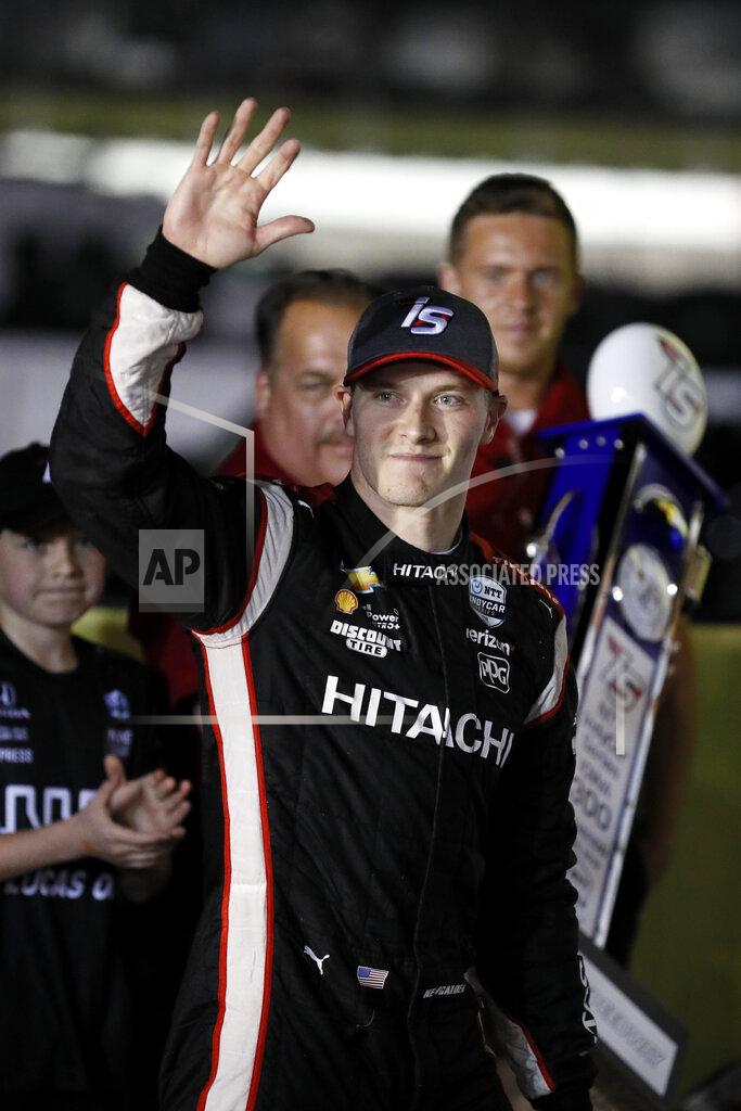 Charlie Neibergall Josef Newgarden celebrates after winning the IndyCar Series auto race Sunday, July 21, 2019, at Iowa Speedway in Newton, Iowa. (AP Photo/Charlie Neibergall)