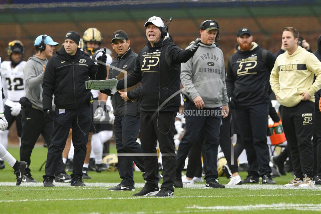 Paul Beaty Purdue coach Jeff Brohm yells to his players during the second half of the team's NCAA football game against Northwestern on Saturday, Nov. 20, 2021, at Wrigley Field in Chicago. (AP Photo/Paul Beaty)