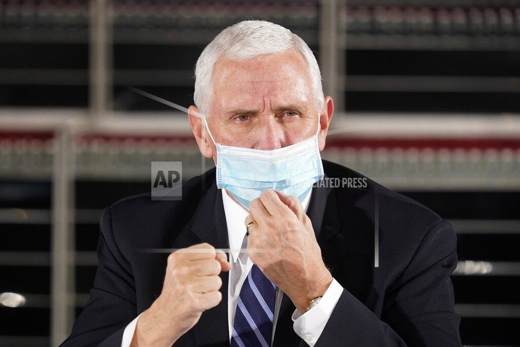 Darron Cummings Vice President Mike Pence speaks during a round table discussion at Catalent Biologics, Tuesday, Dec. 15, 2020, in Bloomington, Ind. (AP Photo/Darron Cummings)