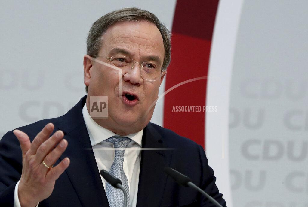 Michael Sohn Armin Laschet, chairman of the German Christian Democratic Union, CDU, addresses the media during a press conference at the party's headquarters in Berlin, Germany, Monday, March 15, 2021 the day after the regional elections in the German states of Baden-Wuerttemberg and Rhineland-Palatinate. Chancellor Angela Merkel's party CDU is considering how to respond to historically bad state election results six months before a national vote that will determine who succeeds Germany's long-time leader. (AP Photo/Michael Sohn, pool)