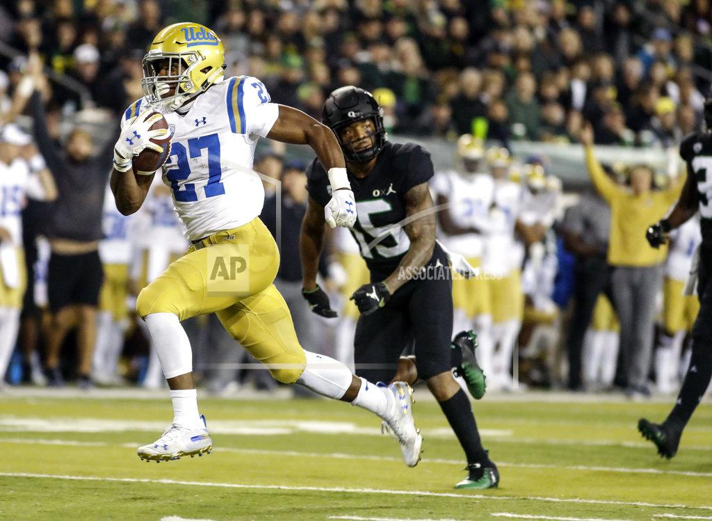 Thomas Boyd UCLA running back Joshua Kelley (27), runs for a touchdown against Oregon during an NCAA college football game in Eugene, Ore., Saturday, Nov. 3, 2018 (AP Photo/Thomas Boyd)