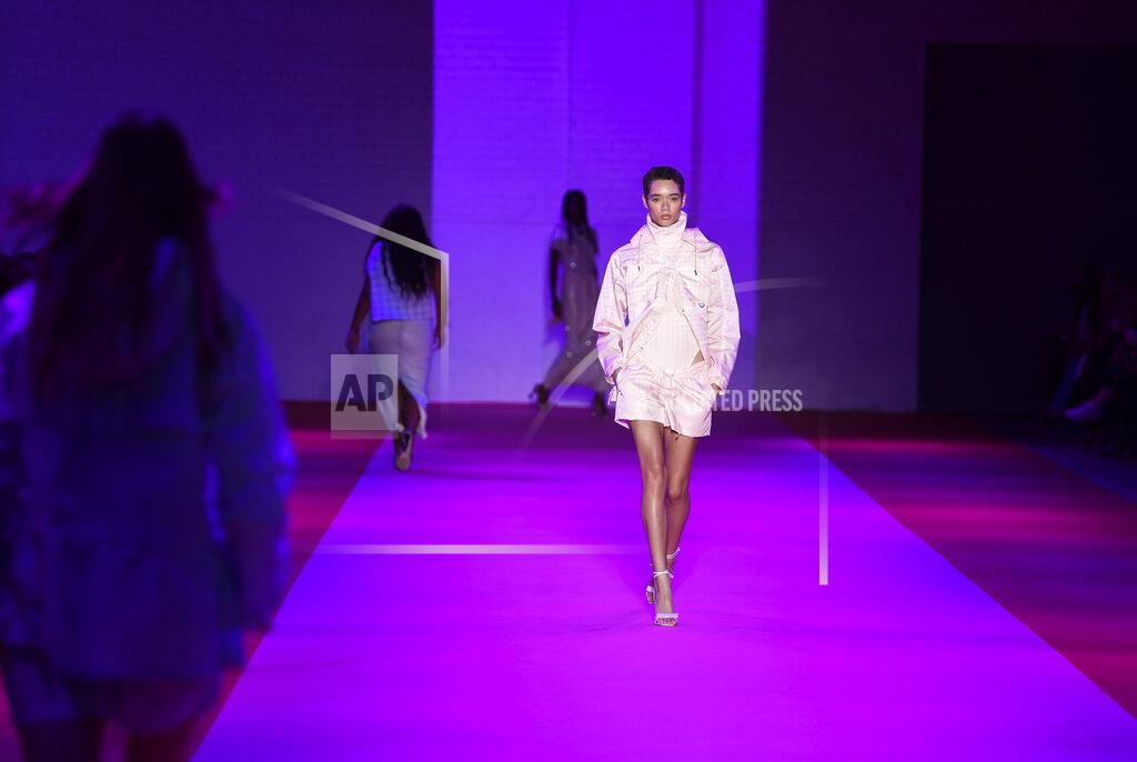 Evan Agostini A model walks the runway at the Brandon Maxwell spring/summer 2022 fashion show in the Brooklyn borough of New York during Fashion Week on Friday, Sept. 10, 2021. (Photo by Evan Agostini/Invision/AP)