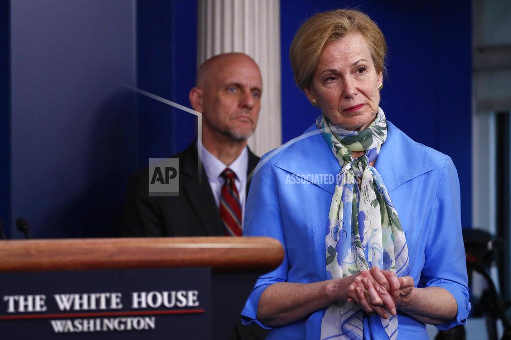 Alex Brandon Dr. Deborah Birx, White House coronavirus response coordinator, and Stephen Hahn, commissioner of the U.S. Food and Drug Administration, listen as President Donald Trump speaks about the coronavirus in the James Brady Press Briefing Room of the White House, Tuesday, April 21, 2020, in Washington. (AP Photo/Alex Brandon)