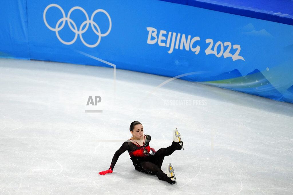Natacha Pisarenko Kamila Valieva, of the Russian Olympic Committee, falls in the women's free skate program during the figure skating competition at the 2022 Winter Olympics, Thursday, Feb. 17, 2022, in Beijing. (AP Photo/Natacha Pisarenko)