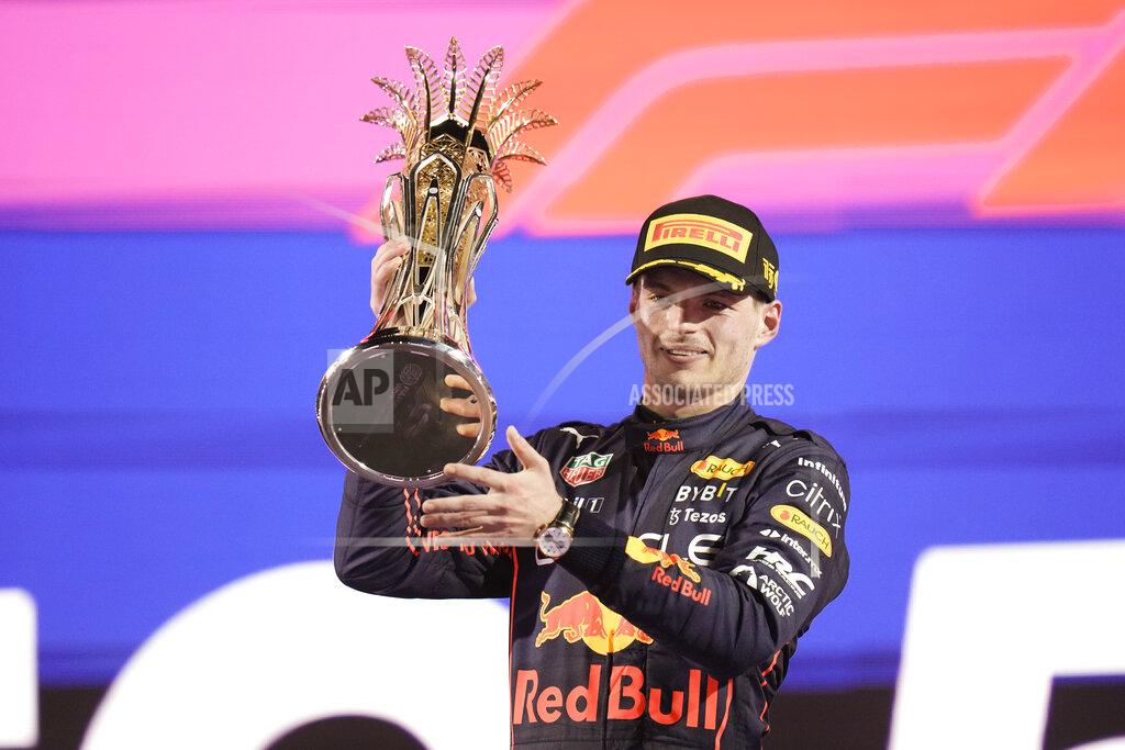 Hassan Ammar Red Bull driver Max Verstappen of the Netherlands celebrates after he won the Formula One Grand Prix it in Jiddah, Saudi Arabia, Sunday, March 27, 2022. (AP Photo/Hassan Ammar)