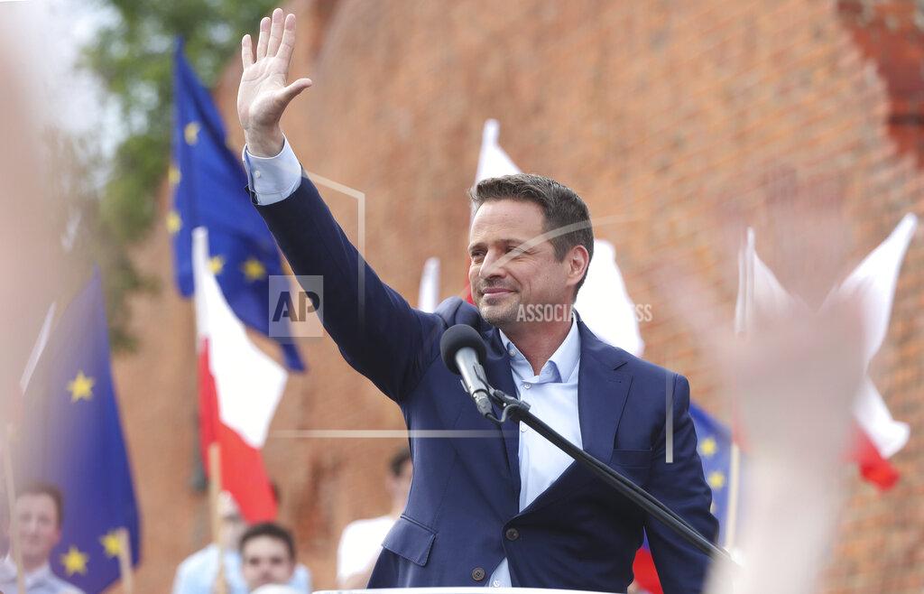 Czarek Sokolowski Candidate in Poland's presidential election, Warsaw centrist Mayor Rafal Trzaskowski addresses supporters on the last day of campaigning before Sunday's vote, in Castle Square in Warsaw, Poland, on Friday, June 26, 2020. Trzaskowski is a major challenger to incumbent conservative President Andrzej Duda who is seeking a second five-year term and is leading in the polls.(AP Photo/Czarek Sokolowski)