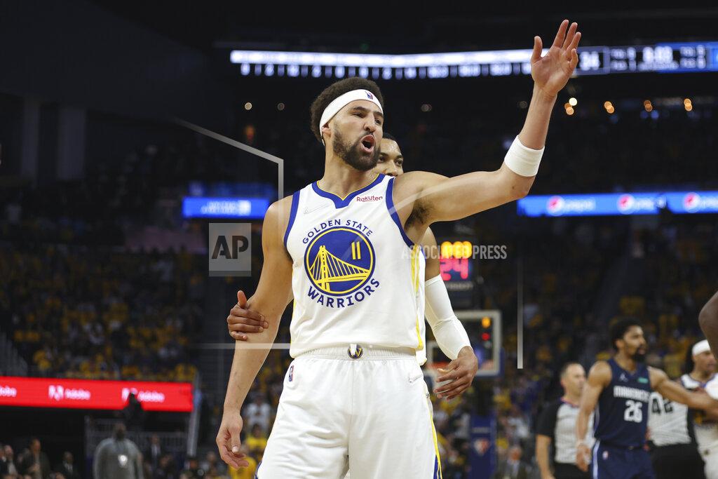 Jed Jacobsohn Golden State Warriors guard Klay Thompson (11) gestures toward Dallas Mavericks players during the first half of Game 2 of the NBA basketball playoffs Western Conference finals in San Francisco, Friday, May 20, 2022. (AP Photo/Jed Jacobsohn)
