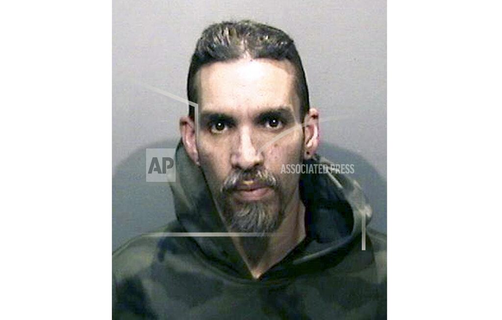 Uncredited FILE - This June 5, 2017, file photo released by the Alameda County Sheriff's Office shows Derick Almena at Santa Rita Jail in Alameda County, Calif. Almena, who is facing a second trial after a 2016 fire killed 36 partygoers at a San Francisco Bay Area warehouse he's accused of illegally converting into a cluttered artists enclave, is expected to plead guilty later this month, relatives of several of the victims said. Almena, 50, is expected to plead guilty to 36 counts of involuntary manslaughter on Jan. 22, 2021. (Alameda County Sheriff's Office via AP, File)