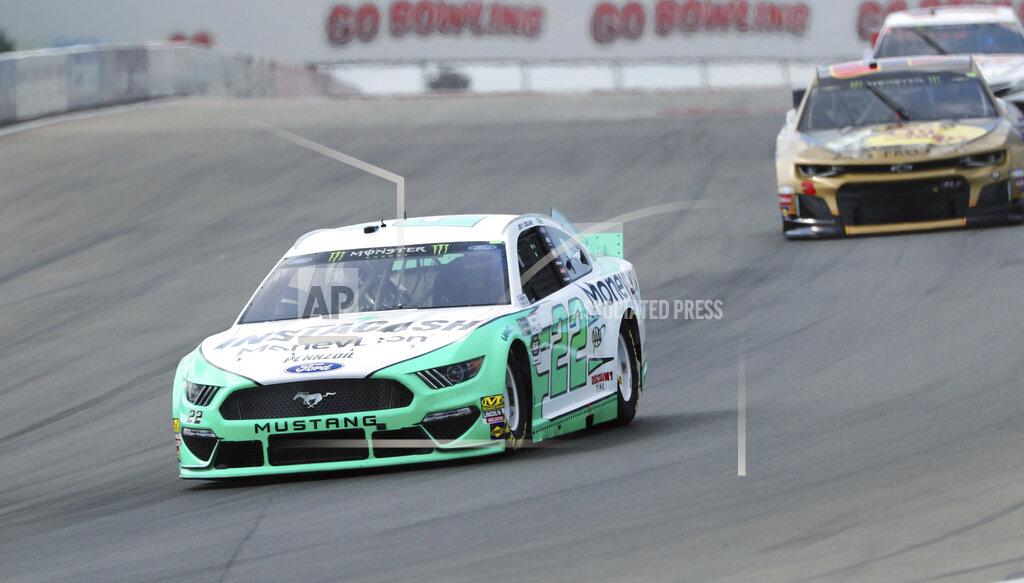 John Munson Joey Lagano (22) heads into Turn 1 during a practice run for the NASCAR Cup Series auto race at Watkins Glen International, Saturday, Aug. 3, 2019, in Watkins Glen, N.Y. (AP Photo/John Munson)
