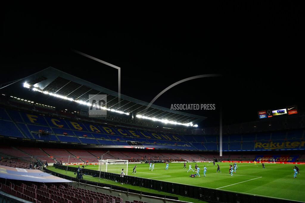 Joan Monfort FC Barcelona and Leganes players during the Spanish La Liga soccer match between FC Barcelona and Leganes at the Camp Nou stadium in Barcelona, Spain, Tuesday, June 16, 2020. (AP Photo/Joan Montfort)