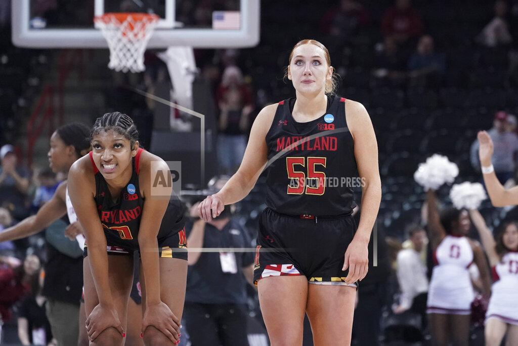 Ted S. Warren Maryland forward Angel Reese, left, and forward Chloe Bibby (55) react at the end of a college basketball game against Stanford in the Sweet 16 round of the NCAA tournament, Friday, March 25, 2022, in Spokane, Wash. Stanford won 72-66. (AP Photo/Ted S. Warren)