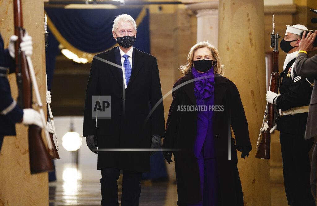 Jim Lo Scalzo Former President Bill Clinton, left, and former Secretary of State Hillary Clinton arrive in the Crypt of the US Capitol for President-elect Joe Biden's inauguration ceremony on Wednesday, Jan. 20, 2021 in Washington. (Jim Lo Scalzo (Jim Lo Scalzo/Pool Photo via AP)