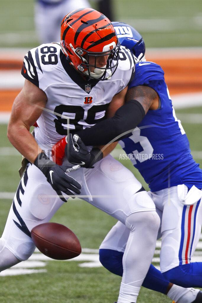 Aaron Doster Cincinnati Bengals tight end Drew Sample (89) fumbles the ball against New York Giants free safety Logan Ryan (23) during the second half of NFL football game, Sunday, Nov. 29, 2020, in Cincinnati. Ryan recovered the ball. (AP Photo/Aaron Doster)