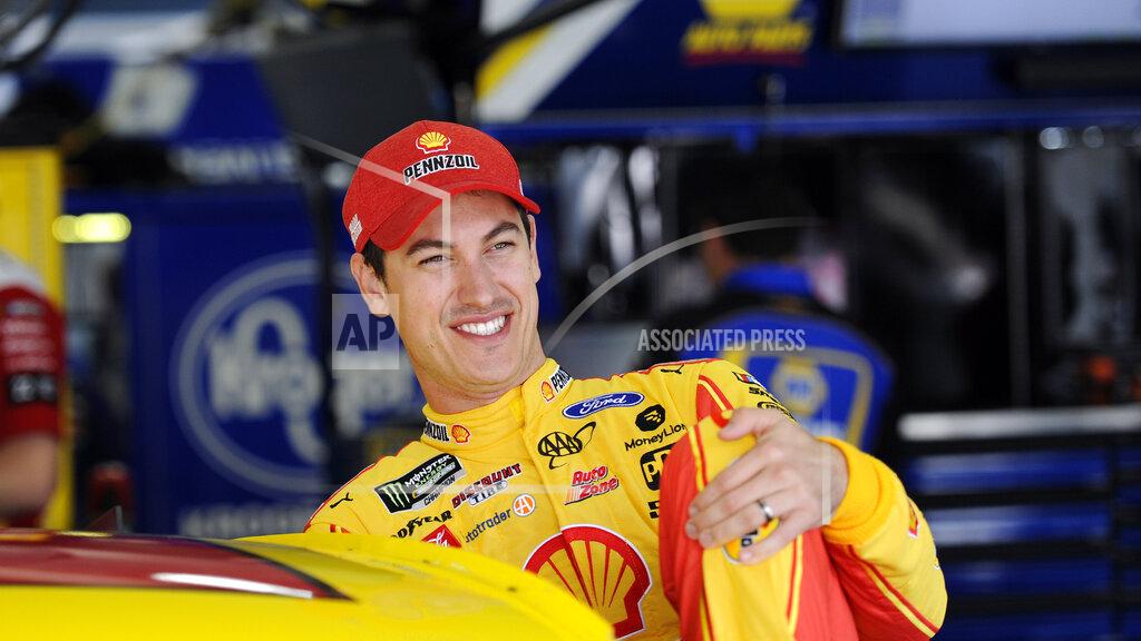 Mike Mccarn Joey Logano smiles during practice for Sunday's NASCAR Cup Series auto race at Charlotte Motor Speedway in Concord, N.C., Saturday, Sept. 28, 2019. (AP Photo/Mike McCarn)