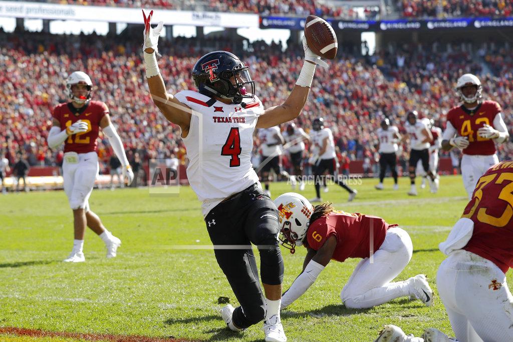 Charlie Neibergall Texas Tech wide receiver Antoine Wesley (4) celebrates in front of Iowa State defensive back De'Monte Ruth (6) after catching a 31-yard touchdown pass during the second half of an NCAA college football game, Saturday, Oct. 27, 2018, in Ames, Iowa. (AP Photo/Charlie Neibergall)