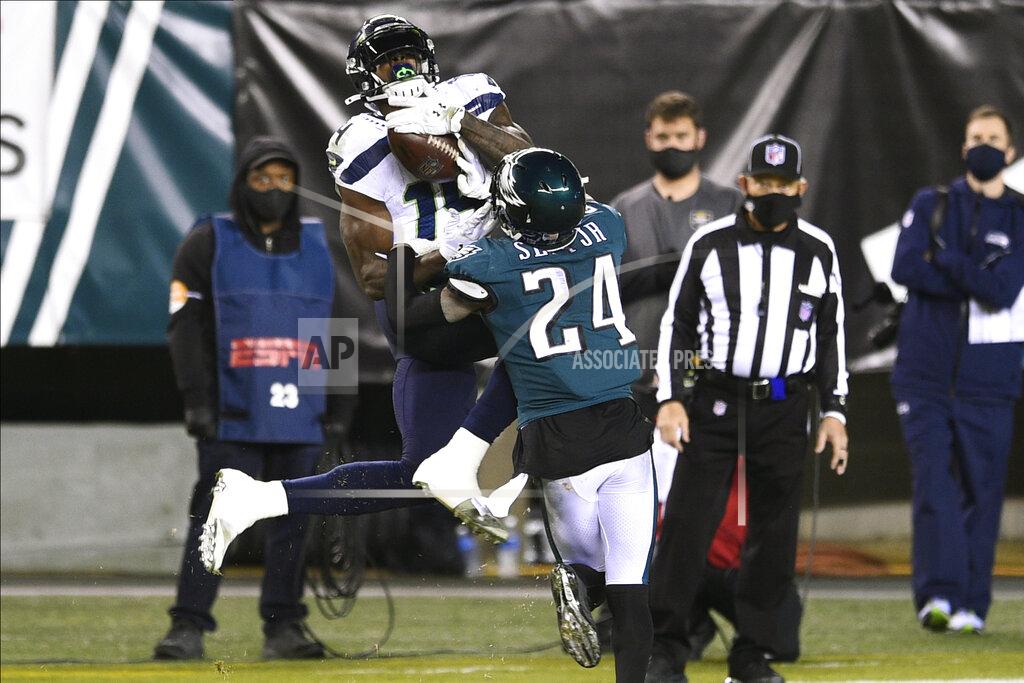 Derik Hamilton Seattle Seahawks' DK Metcalf (14) catches a pass against Philadelphia Eagles' Darius Slay (24) during the second half of an NFL football game, Monday, Nov. 30, 2020, in Philadelphia. (AP Photo/Derik Hamilton)