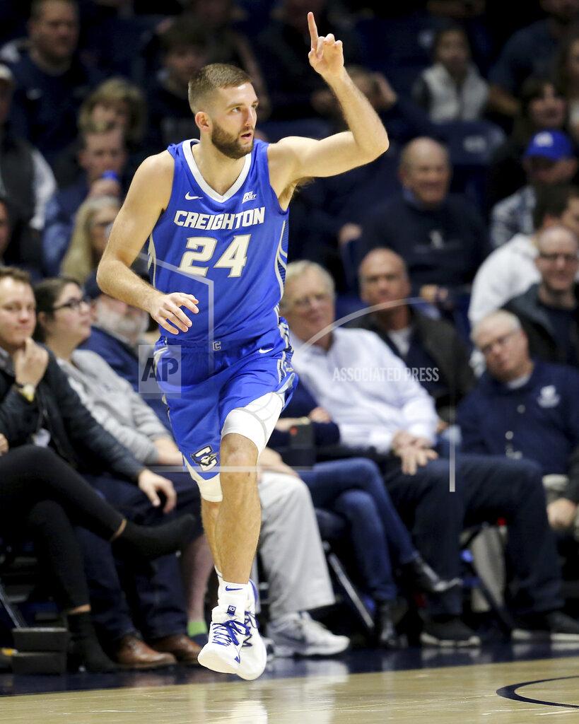 Kareem Elgazzar Creighton guard Mitch Ballock (24) recognizes a teammate after making a 3-point shot in the first half of an NCAA college basketball game against Xavier Saturday, Jan. 11, 2020, in Cincinnati. (Kareem Elgazzar/The Cincinnati Enquirer via AP)