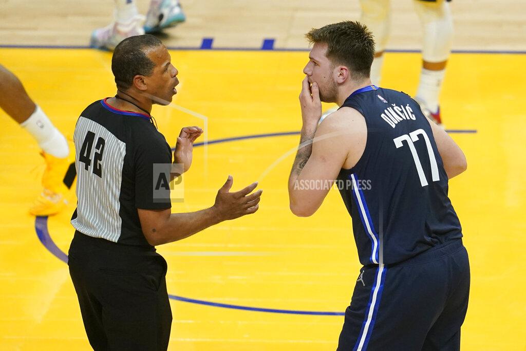 Jeff Chiu Dallas Mavericks guard Luka Doncic (77) reacts toward referee Eric Lewis after being called for a foul against the Golden State Warriors during the first half of Game 2 of the NBA basketball playoffs Western Conference finals in San Francisco, Friday, May 20, 2022. (AP Photo/Jeff Chiu)