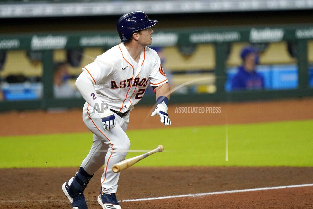 David J. Phillip Houston Astros' Alex Bregman watches his two-run single against the Texas Rangers during the seventh inning of a baseball game Tuesday, Sept. 15, 2020, in Houston. (AP Photo/David J. Phillip)