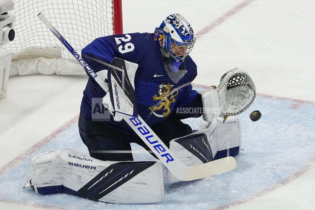 Jae C. Hong Finland goalkeeper Harri Sateri (29) makes a save during the men's gold medal hockey game against the Russian Olympic Committee at the 2022 Winter Olympics, Sunday, Feb. 20, 2022, in Beijing. (AP Photo/Jae C. Hong)