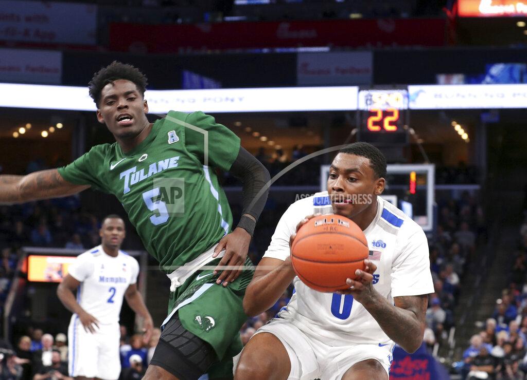 Karen Pulfer Focht Memphis' forward D.J. Jeffries pushes past Tulane guard Teshaun Hightower (5) in the second half of an NCAA college basketball game Monday, Dec. 30, 2019, in Memphis, Tenn. (AP Photo/Karen Pulfer Focht)