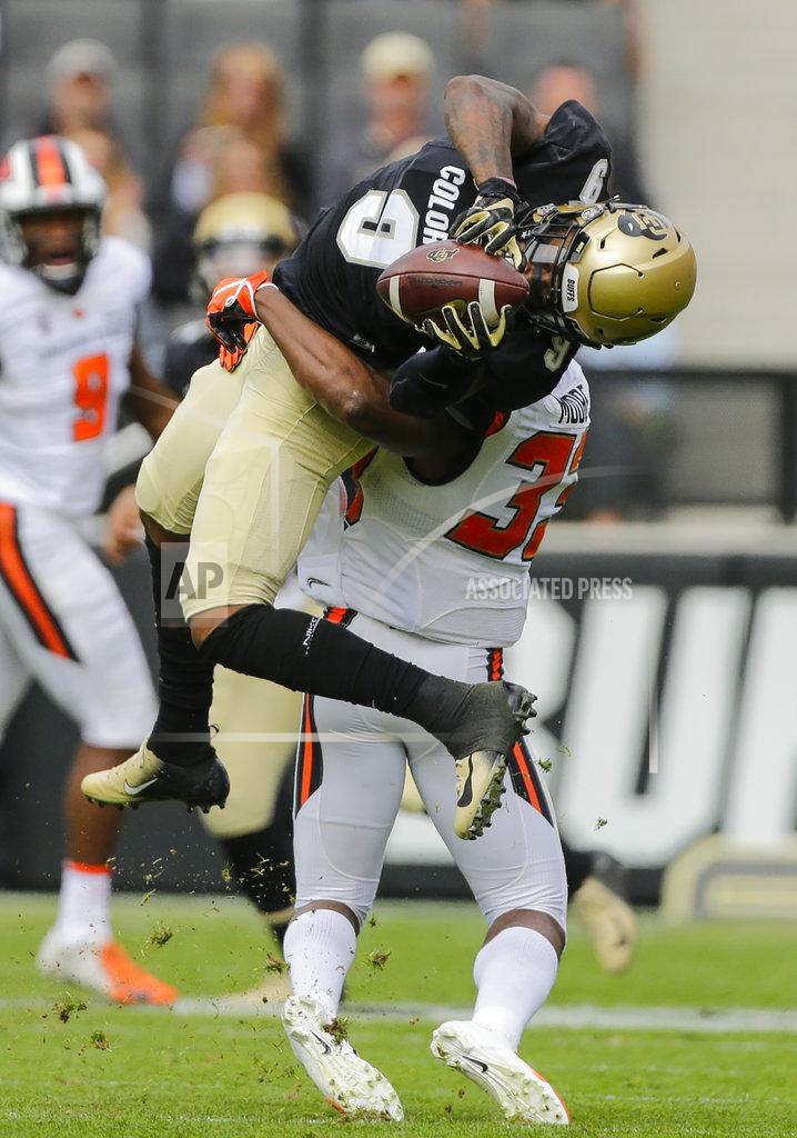 Jack Dempsey Colorado wide receiver Juwann Winfree (9) catches a pass over Oregon State safety Jalen Moore (33) during the first half of an NCAA football game, Saturday, Oct. 27, 2018, in Boulder, Colo. (AP Photo/Jack Dempsey)