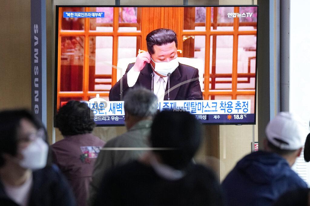 Ahn Young-Joon People watch a TV screen showing a file image of North Korean leader Kim Jong Un during a news program at a train station in Seoul, South Korea, Saturday, May 14, 2022. North Korea on Saturday reported 21 new deaths and 174,440 more people with fever symptoms as the country scrambles to slow the spread of COVID-19 across its unvaccinated population. (AP Photo/Ahn Young-joon)