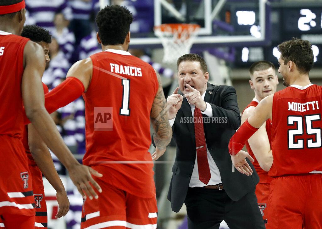 Tony Gutierrez Texas Tech head coach Chris Beard, center, cheers on Tariq Owens (11), Brandone Francis (1), Davide Moretti (25) and Matt Mooney, right rear, during a time out late in the second half of an NCAA college basketball game against TCU in Fort Worth, Texas, Saturday, March 2, 2019. (AP Photo/Tony Gutierrez)