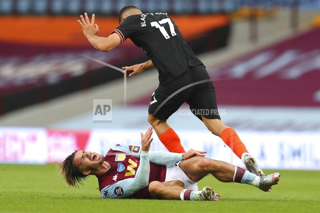 Cath Ivill Chelsea's Mateo Kovacic, top, clashes with Aston Villa's Jack Grealish during the English Premier League soccer match between Aston Villa and Chelsea at the Villa Park stadium in Birmingham, England, Sunday, June 21, 2020. (Cath Ivill/Pool via AP)