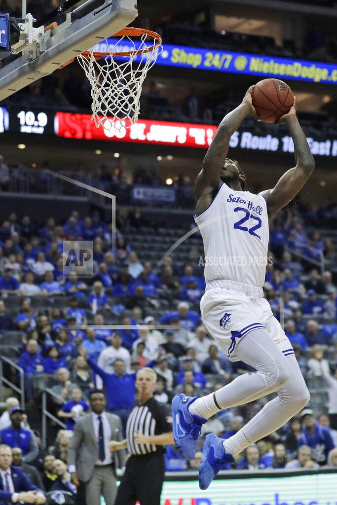 Seth Wenig Seton Hall's Myles Cale spins in the air before dunking during the second half of an NCAA college basketball game against St. John's in Newark, N.J., Sunday, Feb. 23, 2020. Seton Hall defeated St. John's 81-65. (AP Photo/Seth Wenig)