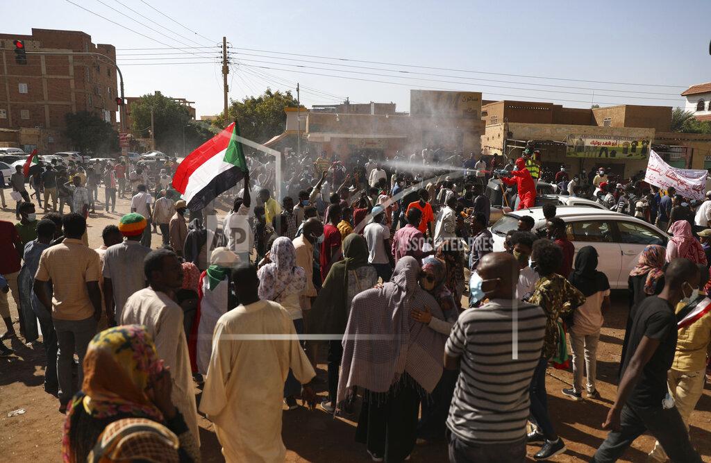 Marwan Ali Protesters gather in Khartoum, Sudan, Saturday, Dec. 19, 2020. Protests in Sudan’s capital and across the country are demanding a faster pace to democratic reforms, in demonstrations that are marking the two-year anniversary of the uprising that led to the military’s ouster of strongman Omar al-Bashir. (AP Photo/Marwan Ali)
