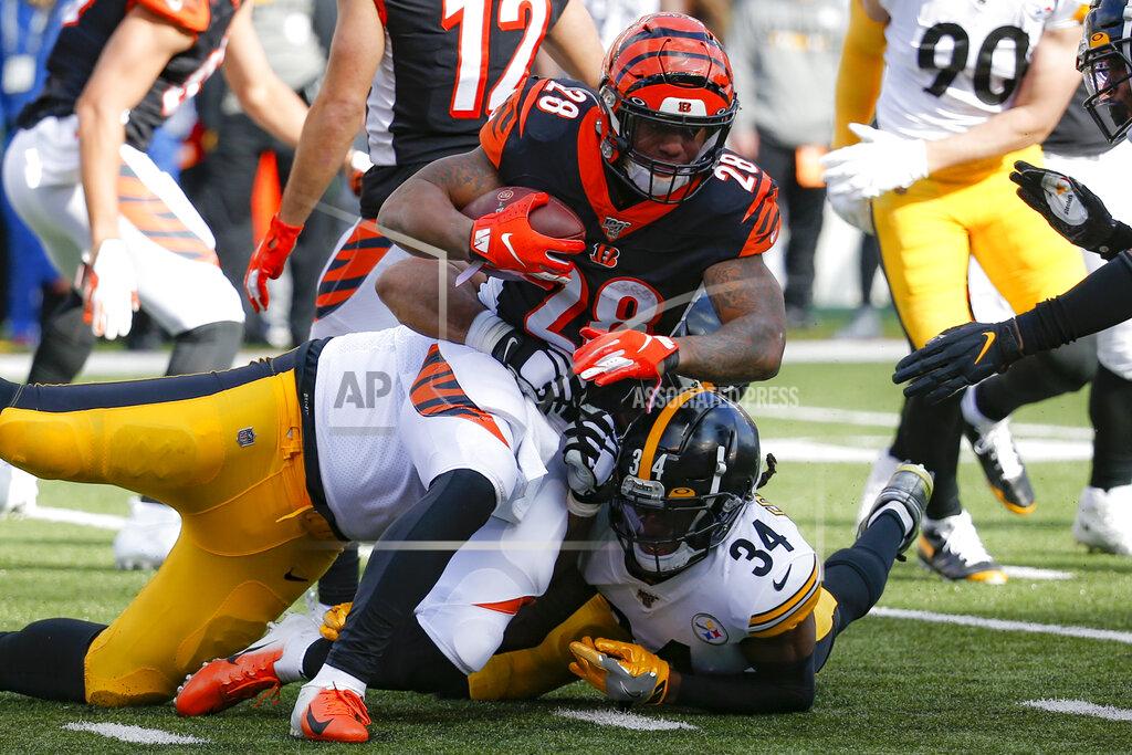 Frank Victores Cincinnati Bengals running back Joe Mixon (28) is tackled by Pittsburgh Steelers strong safety Terrell Edmunds (34) during the first half an NFL football game, Sunday, Nov. 24, 2019, in Cincinnati. (AP Photo/Frank Victores)