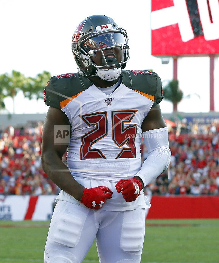 Mark Lomoglio Tampa Bay Buccaneers running back Peyton Barber (25) celebrates his 1-yard touchdown against the Arizona Cardinals during the second half of an NFL football game Sunday, Nov. 10, 2019, in Tampa, Fla. (AP Photo/Mark LoMoglio)