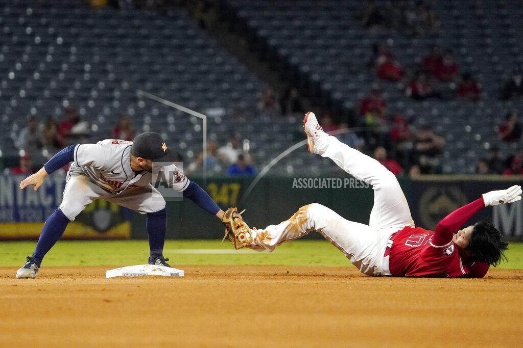 Mark J. Terrill Los Angeles Angels designated hitter Shohei Ohtani, right, is tagged out by Houston Astros second baseman Jose Altuve while trying to steal second during the fourth inning of a baseball game Wednesday, Sept. 22, 2021, in Anaheim, Calif. (AP Photo/Mark J. Terrill)