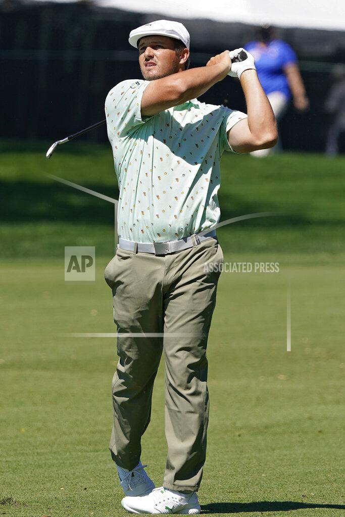John Raoux Bryson DeChambeau hits from the fairway on the ninth hole during the first round of the Arnold Palmer Invitational golf tournament Thursday, March 4, 2021, in Orlando, Fla. (AP Photo/John Raoux)