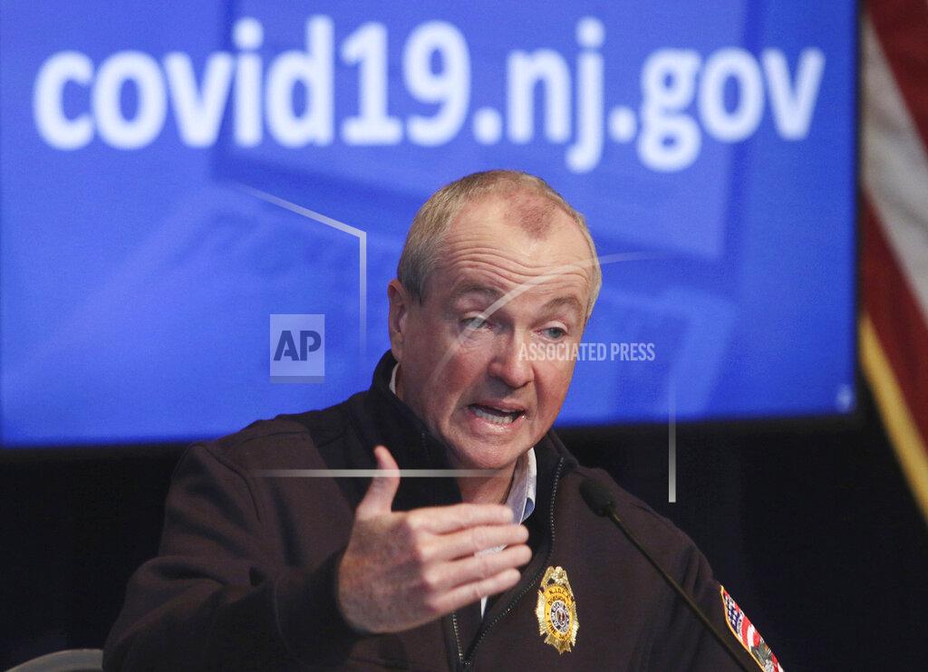 FILE- In this April 25, 2020 file photo, New Jersey Gov. Phil Murphy speaks during his daily press briefing at the the War Memorial in Trenton, N.J. Murphy signed legislation on Thursday, July 16, 2020, authorizing nearly $10 billion in debt to plug budget holes brought on by the coronavirus pandemic, but Republicans sued him, arguing the bill runs afoul of the state constitution. (Chris Pedota/The Record via AP, File)