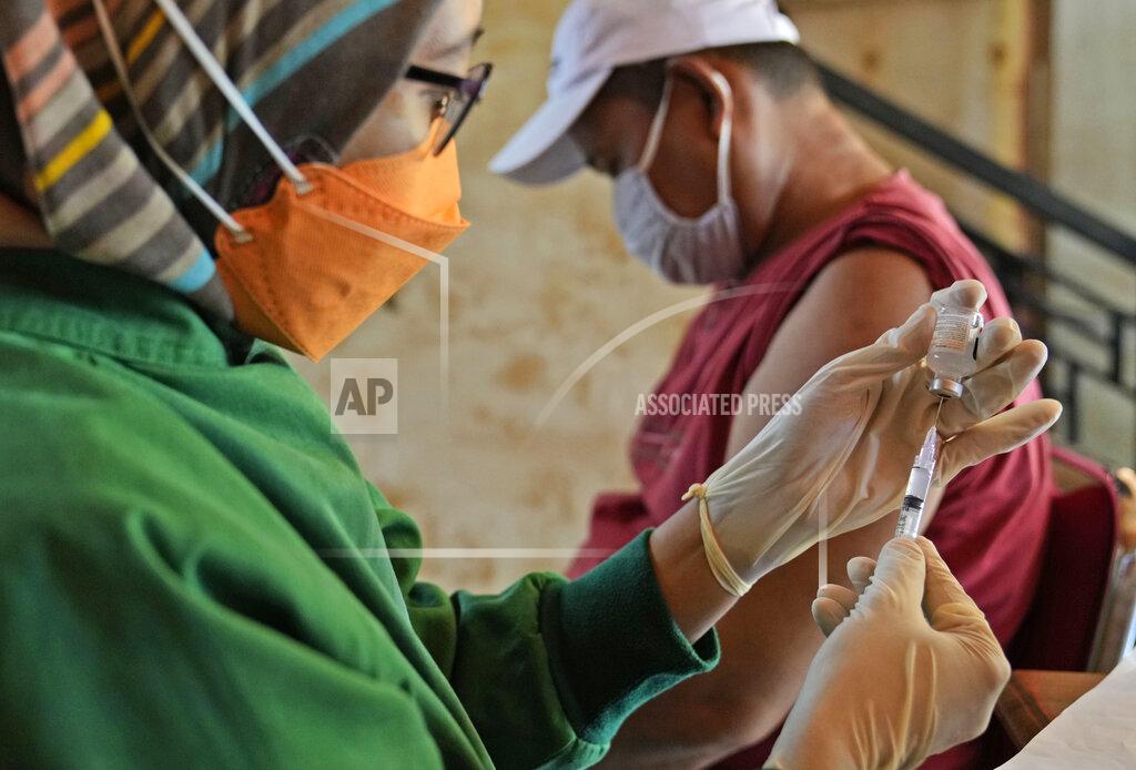 Dita Alangkara A health worker prepares a shot of the Sinovac COVID-19 vaccine during a mass vaccination in Jakarta, Indonesia, Monday, June 21, 2021. Indonesia's president ordered authorities to speed up the country's vaccination campaign as the World Health Organization warned of the need to increase social restrictions in the country amid a fresh surge of coronavirus infections caused by worrisome variants. (AP Photo/Dita Alangkara)