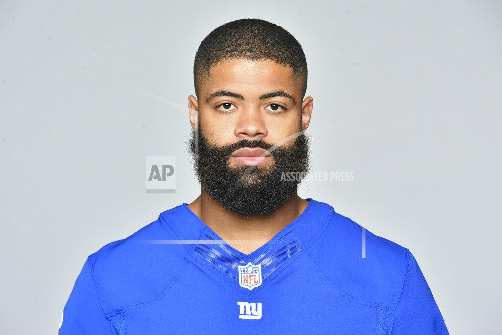 Uncredited FILE - This June 11, 2018, file photo, shows NFL football player Cody Latimer. Latimer is facing five charges, including felony illegal discharge of a firearm, following his arrest in a Denver suburb Saturday morning, May 16, 2020. The Douglas County sheriff's office says deputies arrested 27-year-old Cody Latimer after responding to a report just after midnight of shots fired inside an apartment in Englewood, Colo. (AP Photo/File)