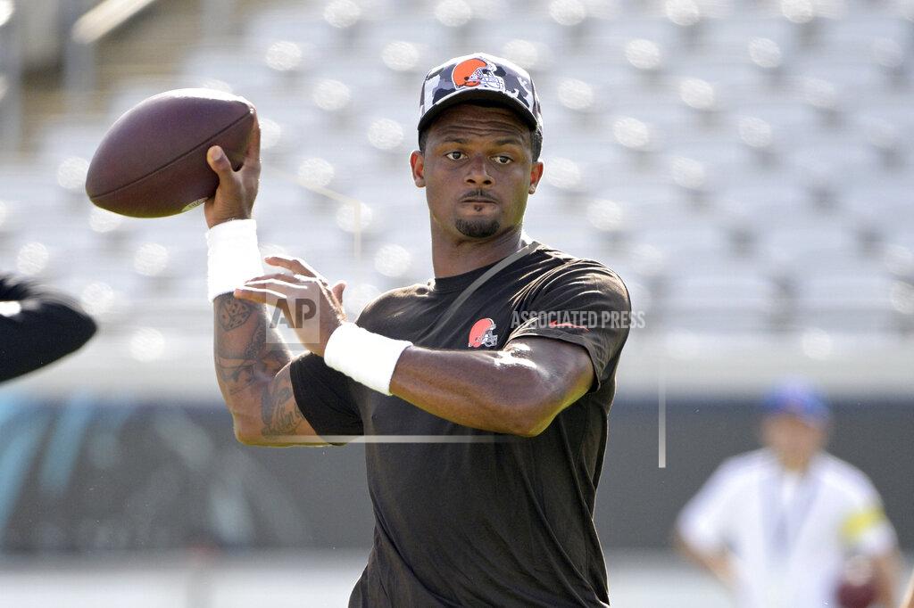 Phelan M. Ebenhack Cleveland Browns quarterback Deshaun Watson (4) warms up before an NFL preseason football game against the Jacksonville Jaguars, Friday, Aug. 12, 2022, in Jacksonville, Fla. (AP Photo/Phelan M. Ebenhack)