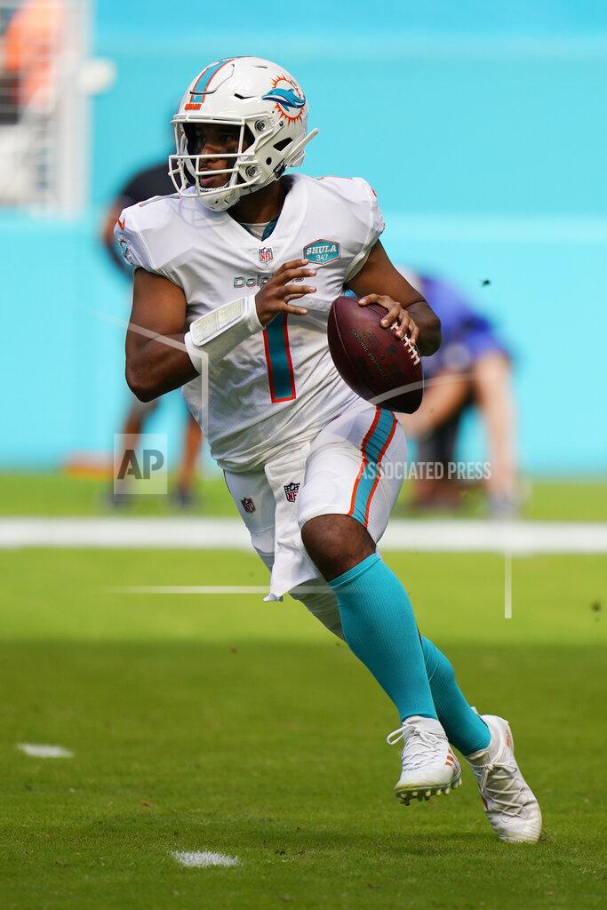 Wilfredo Lee Miami Dolphins quarterback Tua Tagovailoa (1) looks to pass the ball, during the first half of an NFL football game against the Los Angeles Rams, Sunday, Nov. 1, 2020, in Miami Gardens, Fla. (AP Photo/Wilfredo Lee)